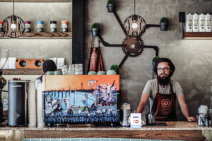 A barista in an article about increasing tips the Yoco way.