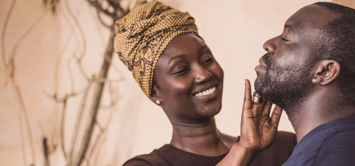 Kafui Awoonor of Kafui Naturals applying beard cream.