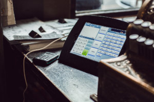 The point of sale system at Truth Coffee alongside a Yoco device.