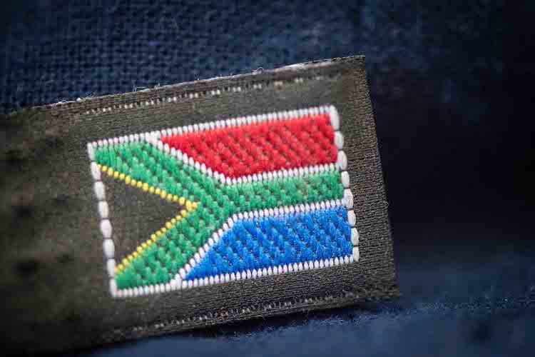 The South African flag stitched on a baby carrier from Ubuntu Baba.