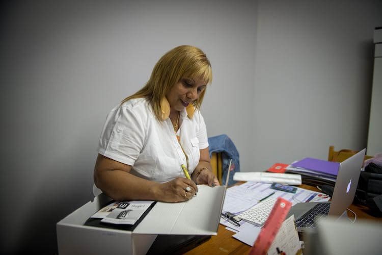 Nadia writing a personal note .