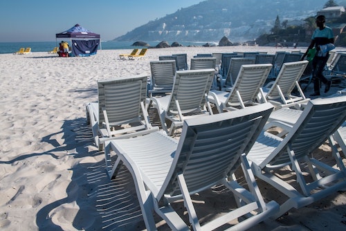 Chairs set up on the beach by JK Vending.