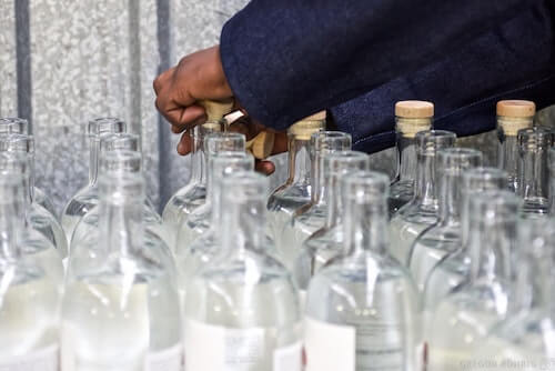 Rows of empty gin bottles at Hope on Hopkins.