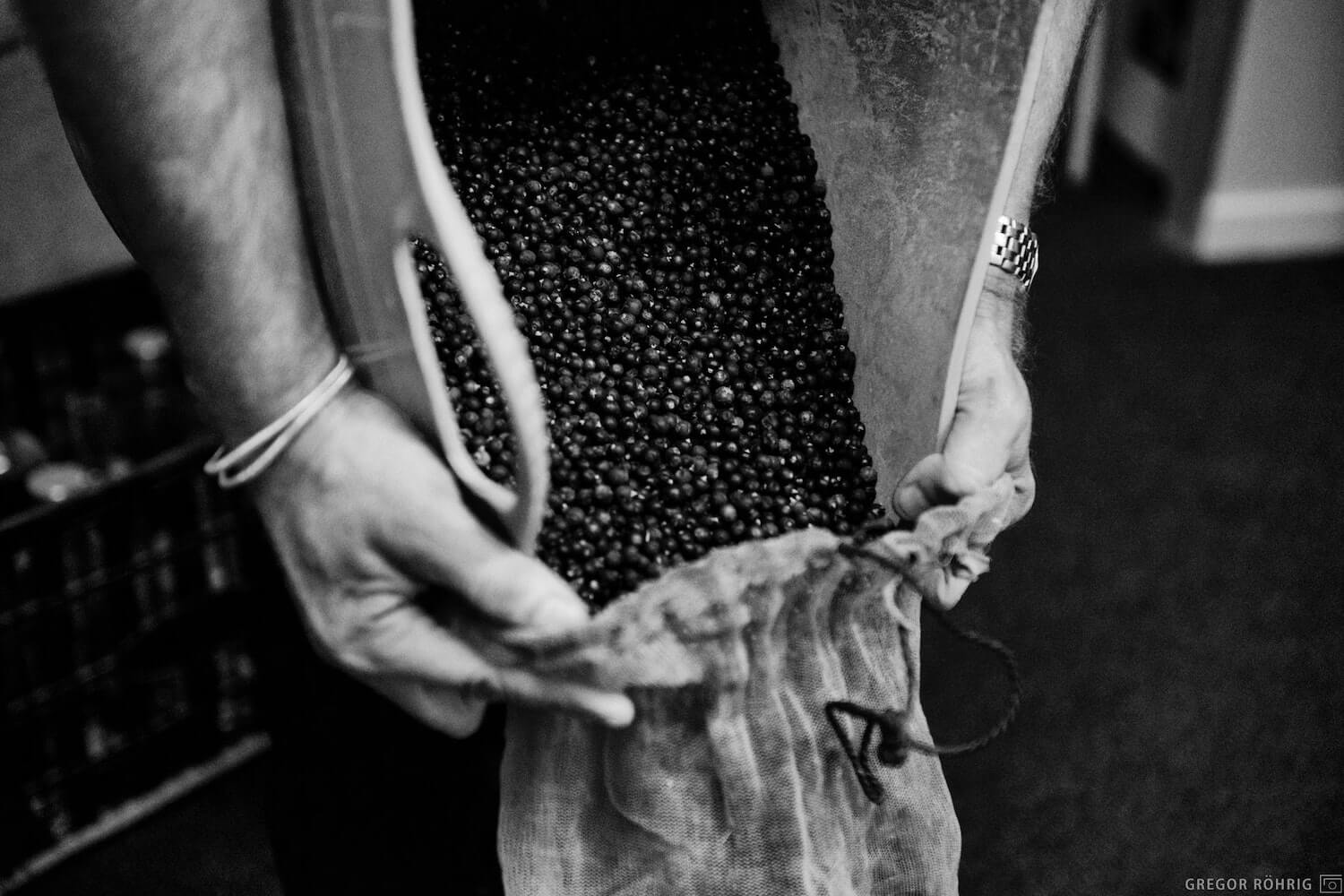 Pouring grain into a bag.