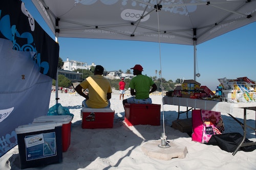 At the tent on the beach.