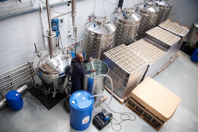 Stirring the gin vat.