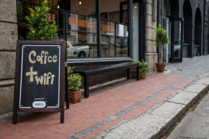 An image of a coffee shop in an article on beating a sales slump.