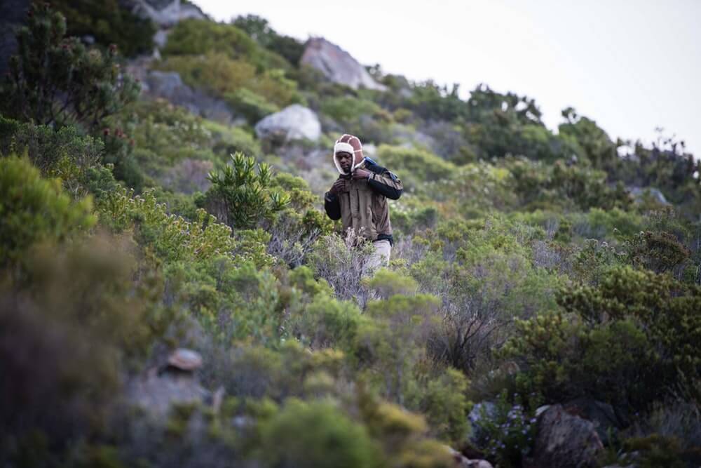 Boniface Chikwenhere searching for wood.