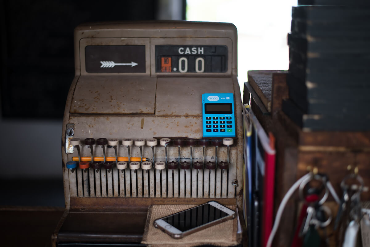 An image of an old typewriter in an article about financial inclusion.